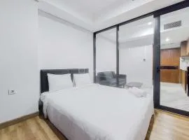 Tranquil and Comfort Living 1BR The Smith Alam Sutera Apartment By Travelio