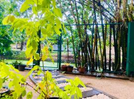 Woodnest Villa Rustic，位于Kochchikade的酒店