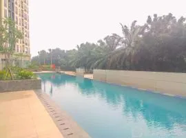 Nice and Comfort 2BR Apartment at Transpark Cibubur By Travelio