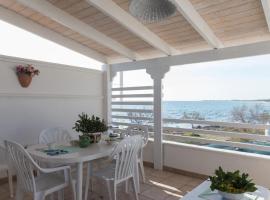 Casa Ezio 2 fronte mare a Punta Grossa di Punta Prosciutto，位于普罗斯西托角的酒店