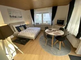 Stilvoll eingerichtete Ferienwohnung mit Terrasse in Tossens