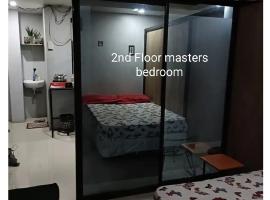 2br near Anjo World Minglanilla，位于Minglanilla的酒店