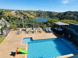 Chácara Gama em condomínio Igarata-SP - Jacuzzi com hidromassagem, piscina e sauna，位于伊加拉塔的酒店