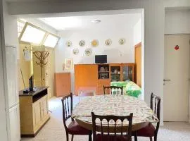 Quadrilocale doppi servizi, piano terra, giardino e posto auto wi-fi