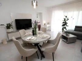 New luxury air-conditioned apartment, with jacuzzi, free parking and gardens