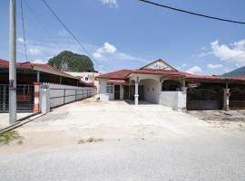 OYO 91011 Iman Roomstay Gua Musang，位于话毛生的酒店