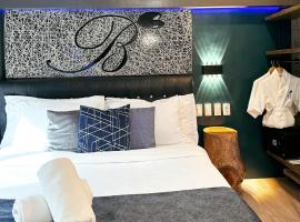 Blue Tulip - 4mins from Mactan Airport，位于Pusok麦克坦－宿务国际机场 - CEB附近的酒店