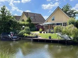 Carpe Diem with jetty and boat