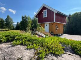 Unik overnatting i Stabbur/Minihus，位于Lunde的带停车场的酒店