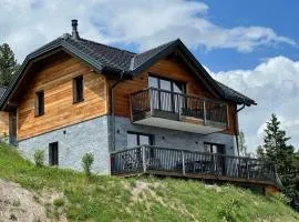 Tomtegl-Bergchalet-No-10-mit-Privatsauna-Infinitypool-Kamin-Fitnessraum-1500m-Seehoehe