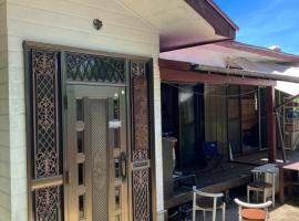 与論ゲストハウス ズッ友荘，位于Furusato的酒店