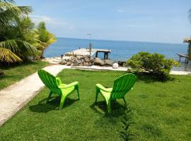 Chambres chez Maeva, bord de mer privé，位于乌图罗阿的住宿
