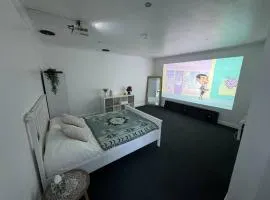 Spacious private cinema guest house