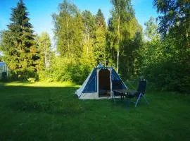 Cosy tent in garden of Swedish landhouse