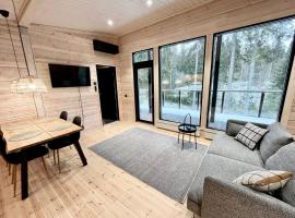 Black Cabin Vierumäki，位于维耶鲁迈基的酒店