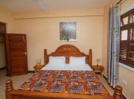 Tinga Tinga - King Bed Room