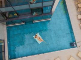 Via Roma 33 Tuscany Boutique Hotel & Spa - Adults Only，位于斯蒂亚的酒店