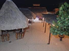 REYNA DEL MAR cabaña frente al mar，位于特鲁希略的酒店