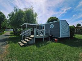 Mobil-home 4 personnes dans camping 5 étoiles proche de la mer，位于乌尔加特的酒店