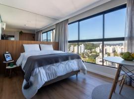 Loft próximo a Vila Germânica e FURB com vaga.，位于布卢梅瑙的酒店