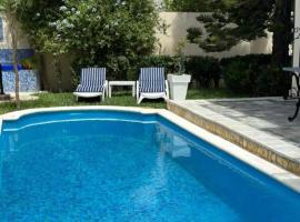 Magnifique duplex avec piscine，位于Ouled Fayet的酒店