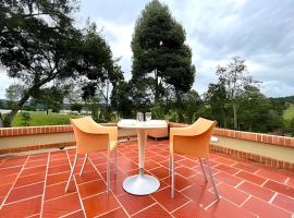 Lujosa Cabaña Represa del Sisga TV Wifi Cocina BBQ，位于Chocontá的酒店