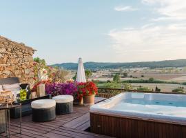 Casa rural con jacuzzi en centro histórico de Pals，位于帕尔斯的酒店