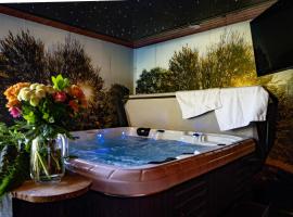 Drents Genieten - Dopheide met privé jacuzzi en sauna，位于Erm的酒店