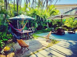 Tombo Beach Hostel & Pousada Surf Yoga Bem-estar，位于瓜鲁雅的酒店