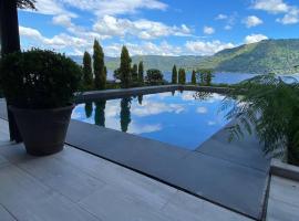 AM009 Beautiful Cozy Lake Home，位于Villa Nueva的酒店