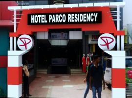 Parco Residency，位于Tellicherry萨拉齐火车站附近的酒店
