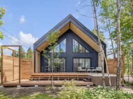 Villa Rosa Madha - Scandinave - Cosy avec spa，位于Sainte-Catherine的酒店