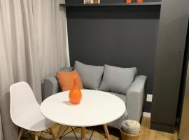 LOFT confortável e moderno com garagem perto da FURB e Vila Germânica，位于布卢梅瑙的酒店