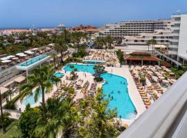 尔卡诺春天酒店，位于美洲海滩的酒店