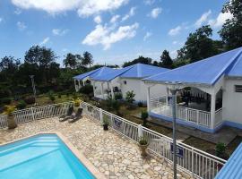 Bungalow charmant a Capesterre 67 m² avec piscine partagee，位于卡佩斯特雷贝勒奥的酒店