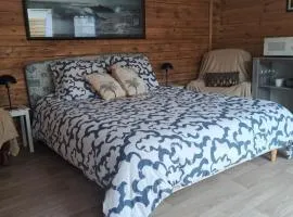 Chambre dans chalet entre terre et mer