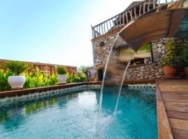 LEVISSI LODGE OTANTIC STONE VILLA in KAYAKOY，位于卡亚克的酒店