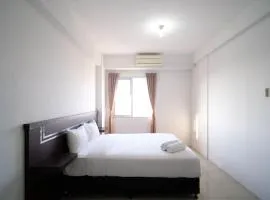 Simple 2BR with Extra Bed at Menara Rungkut Apartment By Travelio