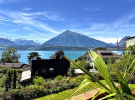 The Bluemlisalp, a private holiday flat with the lake of Thun view，位于图恩湖畔上霍芬的酒店