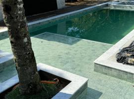 Casa Pé na Areia Condomínio fechado com piscina resort na Sununga - Ubatuba，位于乌巴图巴的酒店