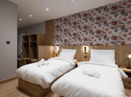 University Boutique Rooms，位于姆西达的酒店