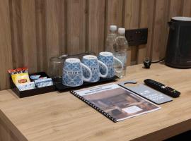 University Boutique Rooms，位于姆西达的酒店