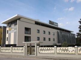 One Hotel & Restaurant，位于达尔米内的酒店