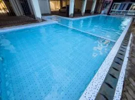 THREE-BEDROOM FULLy FURNISHED BEACH VIEW APARTMENT WITH A SWIMMING