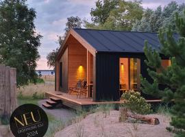 Werder Chalet -- GRO&szlig;ES SONNENDECK -- Strand 150m I Sauna I eKamin I bis 8 Pers I Meerblick I by "Meyers am Meer"，位于博伊恩斯多夫的木屋