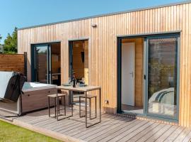 Le Laponya - Chalets climatisés avec SPA & Borne de recharge，位于布雷索勒的酒店