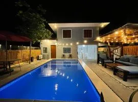 Babak Point Inland Resort - Exclusive Home with Pool in Samal
