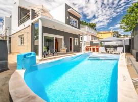 Casa Férias Charneca da Caparica，位于沙尔内卡的酒店