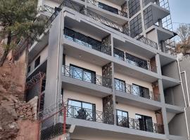 The bliss avenue hotal，位于穆里的酒店