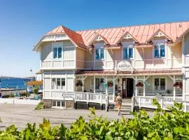 Strandvillan Hotell och Bed & Breakfast，位于吕瑟希尔的海滩短租房